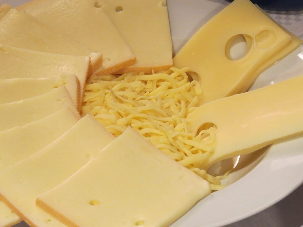 cheese, grated, discs, raclette cheese, raclette, gouda cheese, emmental, food, ingredient, meal, yummy, hearty, cheeses, emmental cheese, plate, cheese, cheese, cheese, cheese, cheese, raclette